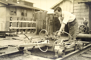 1950: Invents railroad track maintenance machine, obtains patent and begins its production for delivery to Japan National Railways.